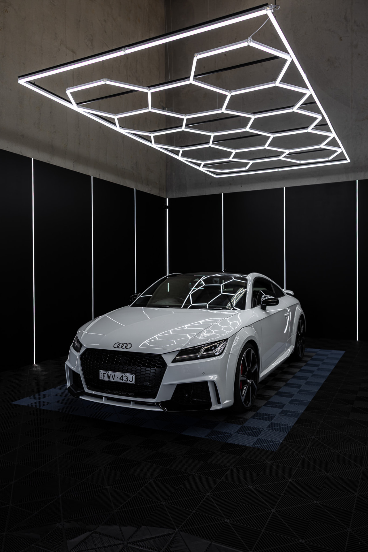 White Audi TT inside the shared Wetherill Park workshop